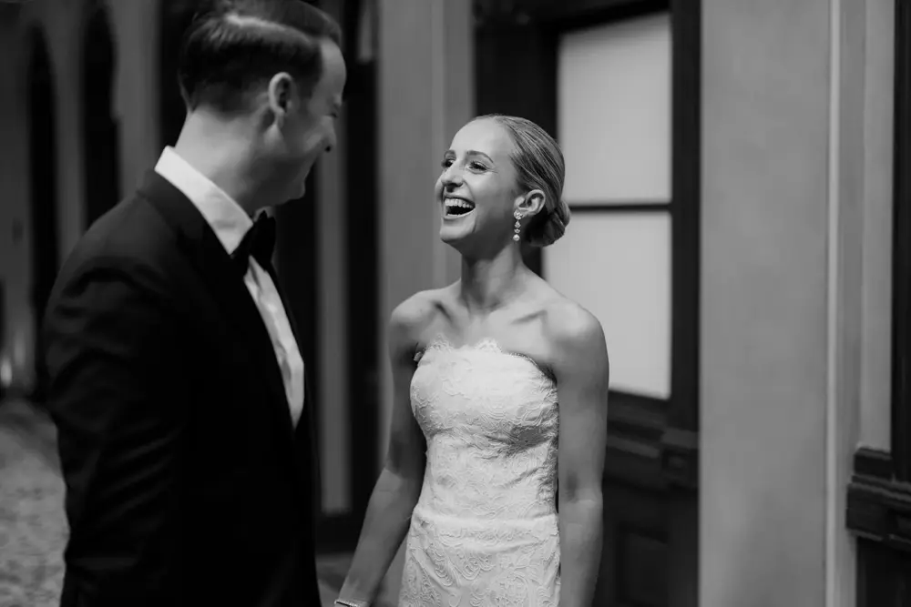 Bride with elegant hairstyle showcasing statement earrings