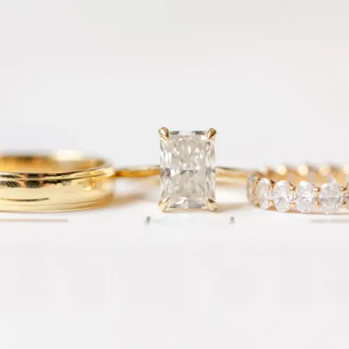 Close-up of diamond engagement ring on bride's hand