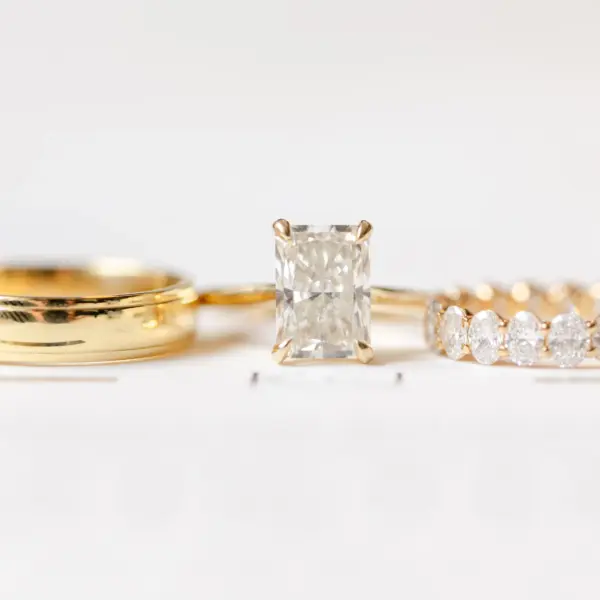 Close-up of diamond engagement ring on bride's hand