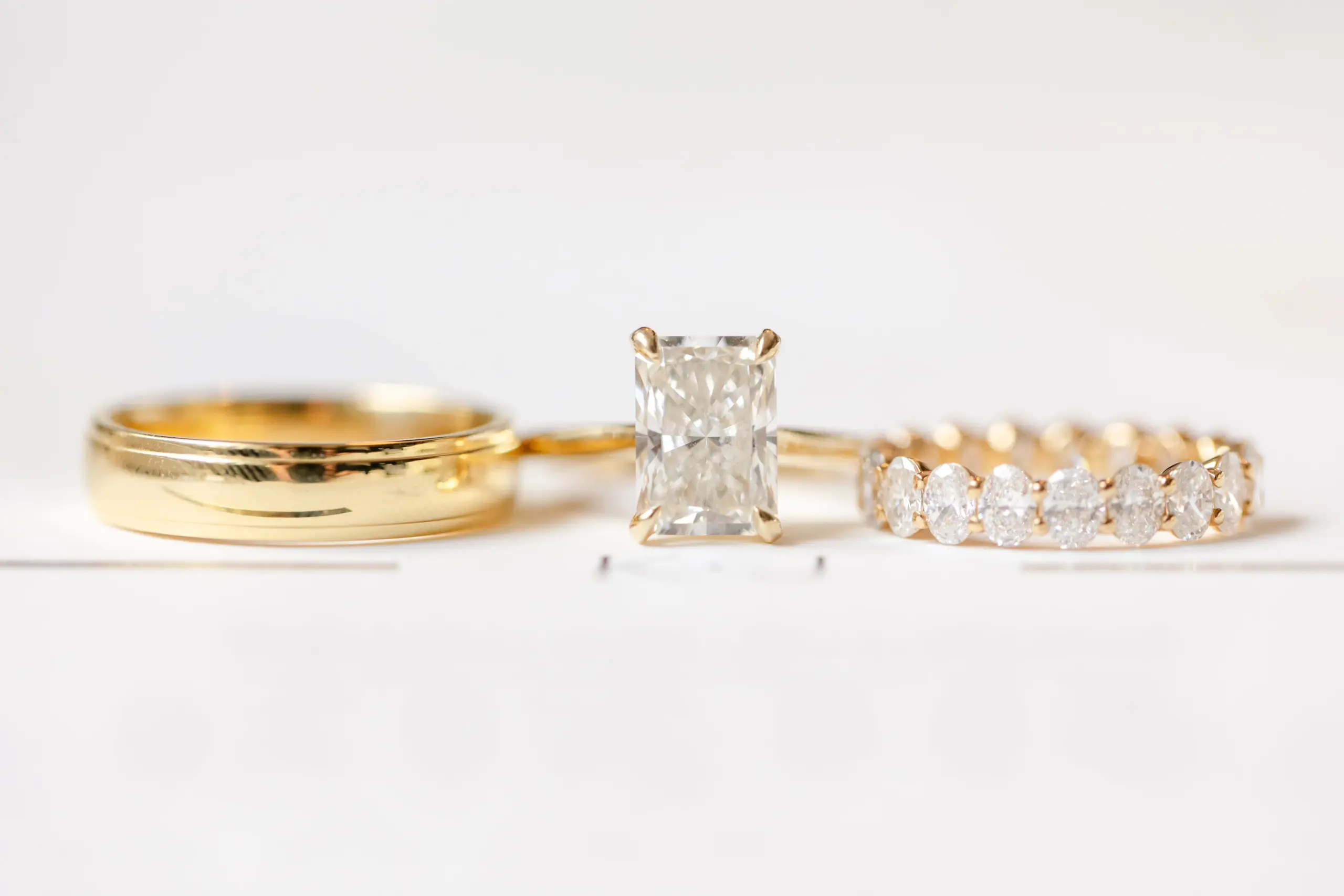 Close-up of diamond engagement ring on bride's hand