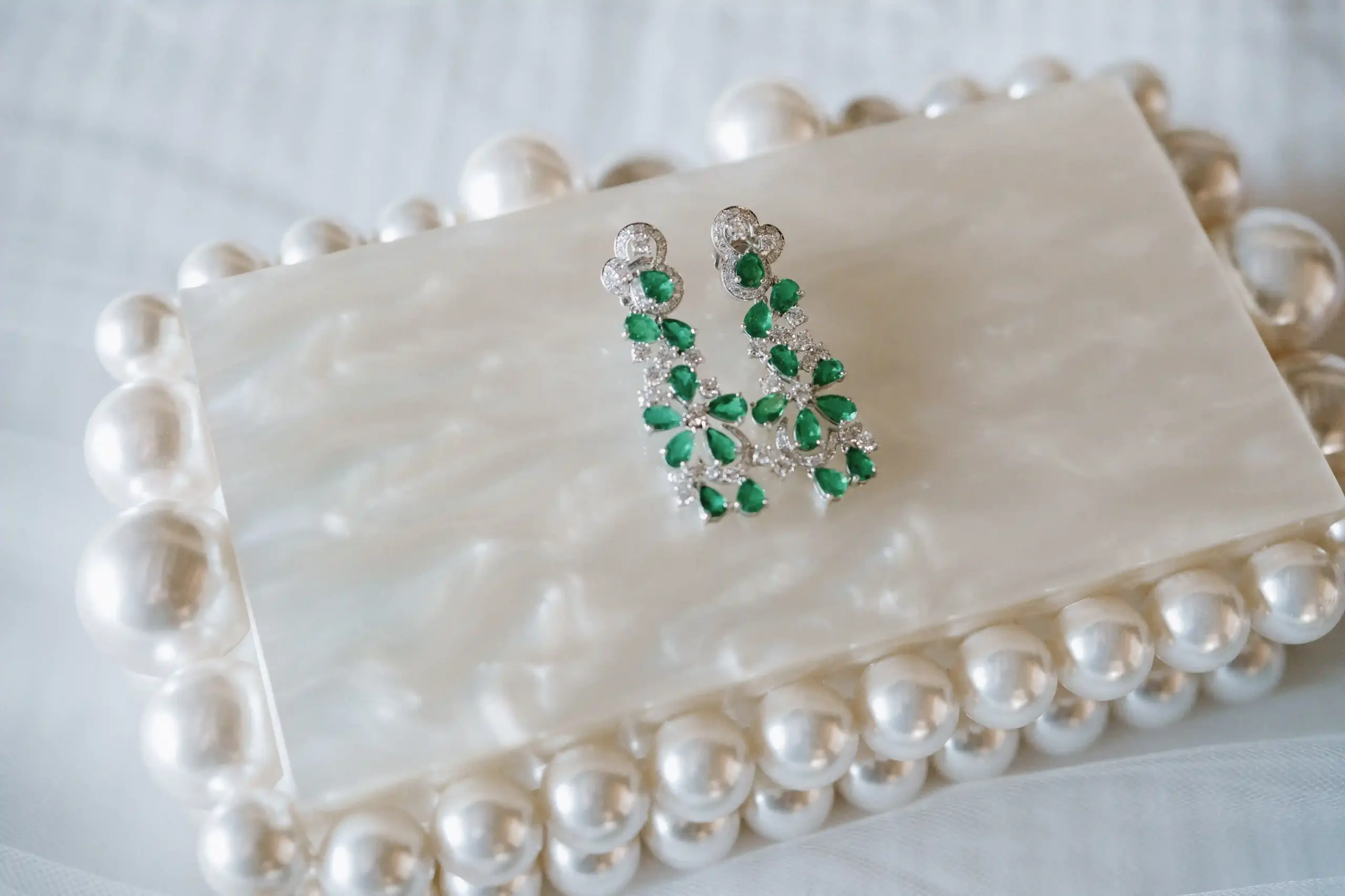Bride wearing heirloom-inspired fine jewelry at her wedding
